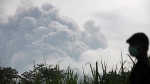  Volcanic ash from a major eruption in Indonesia shrouded a large swath of the country's most densely populated island on Friday, closed three international airports and sent thousands fleeing. Picture: AP Photo/Trisnadi Source: AP 